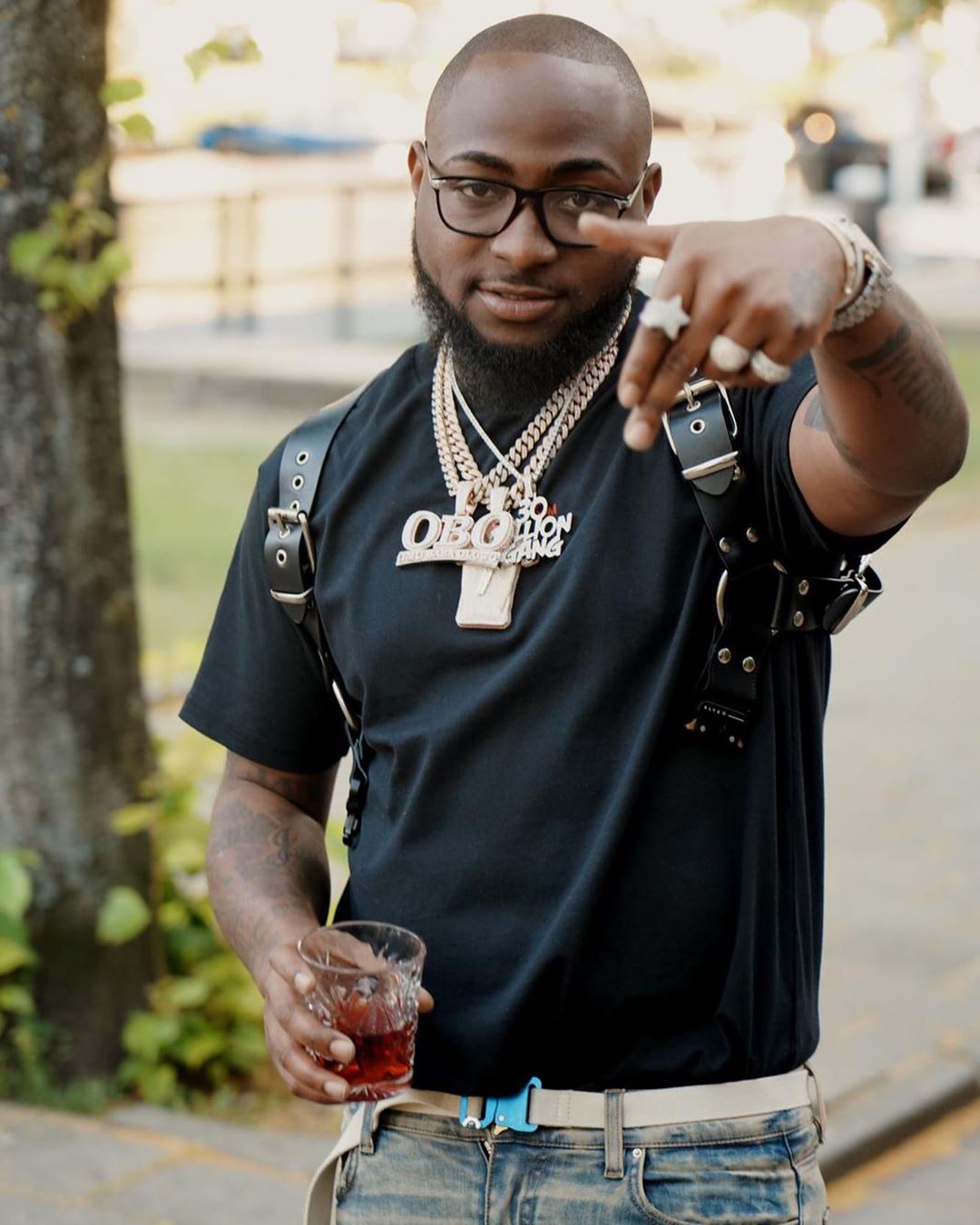 Davido reveals the front Cover of his Album with Chioma carrying his baby