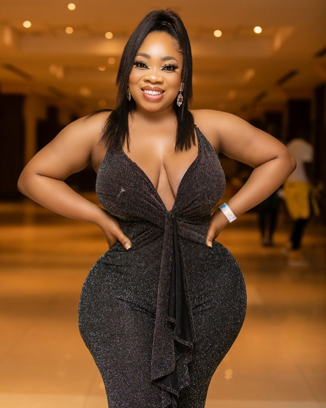 Ghanaian Curvy Actress Moesha Boduong shows off Major cleavages in a Braless outfit (Photos)