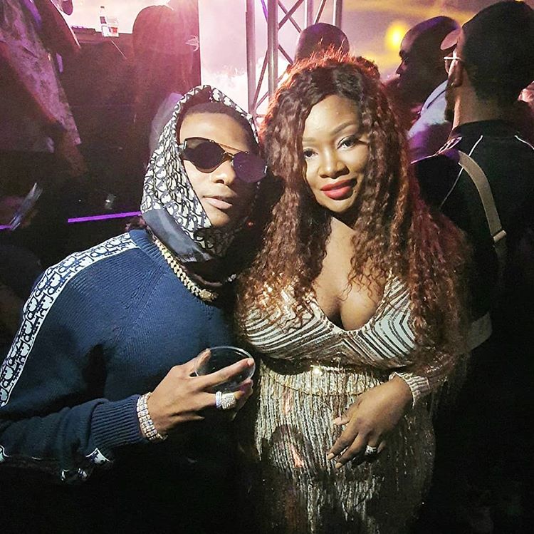  Wizkid and OAP Toolz in a Cleavage Baring Dress at One Africa Music Festival (Photo)