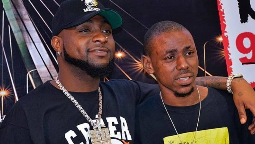 Davido gifts fans who tattooed his name over his body N6.3M, adopts him into 30BG Gang (Video)